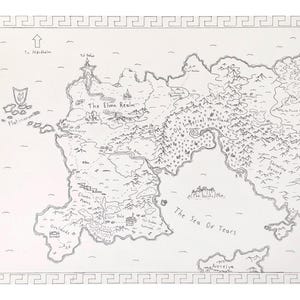 May include: A black and white hand-drawn fantasy map on paper featuring geographical regions like The Elven Realm, Old Imperial Heartland, and Skyline Desert. It includes labels such as Platinorum, Orclands, and The Sea of Tears, all enclosed in a Greek key border.