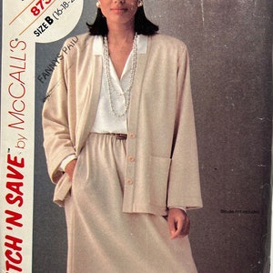 May include: A beige skirt and jacket sewing pattern with a model wearing the finished garment. The pattern is for sizes 16, 18, and 20. The pattern is called "Stitch 'N Save" by McCall's and the pattern number is 8732.