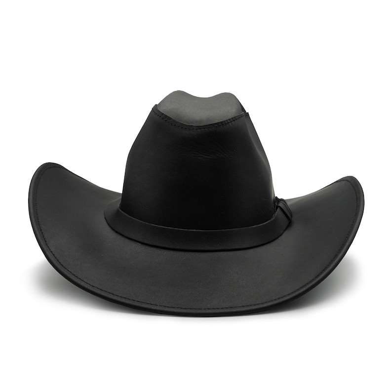 May include: A solid black leather cowboy hat featuring a pinched crown and a wide, curved brim. The hat includes a matching black leather band encircling the base of the crown, with visible stitching along the edges of the brim and the band.