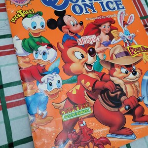 Walt Disney's World on Ice Program Book, Produced by Kenneth Feld, Souvenir Program and Activity Book, 1991 Ice Follies and Holiday On Ice