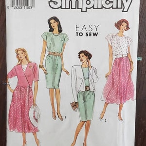 May include: Simplicity sewing pattern number 7164 for sizes U5 (16-24) and EUR U5 (44-52). The pattern includes three different dress designs: a green dress with a belt, a pink dress with a wrap detail, and a green skirt with a white jacket. The pattern is labeled "Easy to Sew".