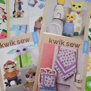 May include: Four sewing patterns featuring various plush toys and home decor items. The patterns include a dog wearing a bow tie, a cat with a heart, a baby Yoda, and a quilted blanket and pillow.