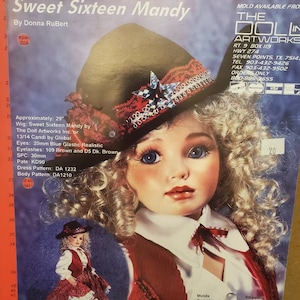 May include: A porcelain doll named Sweet Sixteen Mandy, wearing a red and white dress with a black vest and a black and red hat. The doll has blue eyes and brown hair. The doll is 29 inches tall.