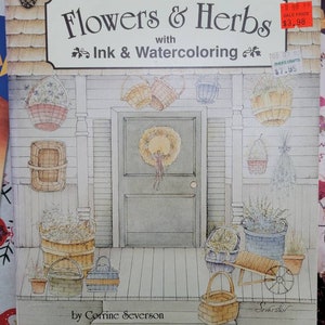 May include: A book cover with a watercolor illustration of a porch with flowers and herbs in baskets and pots. The title of the book is "Flowers & Herbs with Ink & Watercoloring". The book is by Corrine Severson and is easy enough for beginners.