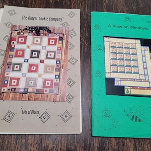 May include: Two brown paper pattern books with a quilt block design. The first book is titled "The Ginger Cookie Company" and features a quilt block design with the text "Lots of Blocks." The second book is titled "A View on Windows" and features a quilt block design with the text "I've Been Thinking."
