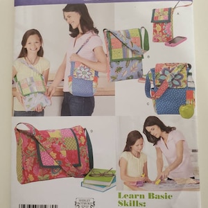 May include: Simplicity Learn to Sew sewing pattern number 1935. The pattern includes instructions for making four different bags: a small phone pouch, a small crossbody bag, a larger crossbody bag, and a large tote bag. The pattern also includes instructions for making a 9-patch quilt block, faux binding, and inserting a lining.