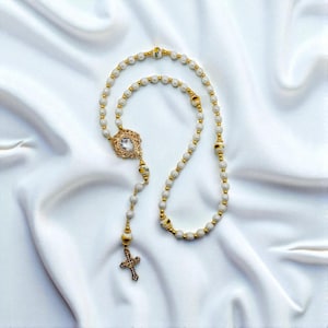 white catholic rosary, porcelain and ceramic stones, stainless steel