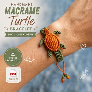 May include: Handmade macrame turtle bracelet in orange and green. The turtle design is the focal point, with a detailed shell and flipper design. The bracelet is secured with an adjustable cord and beads. The text on the image says "Soft, Cute, Unique".