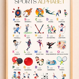 May include: A framed educational poster titled SPORTS ALPHABET featuring twenty-six illustrations of various sports and activities, each paired with a corresponding letter from A to Z, including archery, baseball, cricket, diving, and yoga.