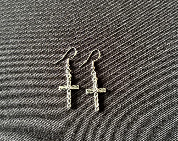 Notted cross dangly earrings
