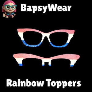 May include: Two pairs of eyeglasses with a rainbow design, featuring pink, white, and blue glitter. The text "Rainbow Toppers" is displayed at the bottom, with the brand name "BapsyWear" at the top. The background is black.