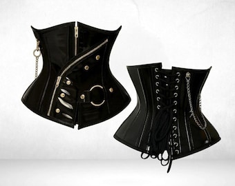 May include: Two black corsets. One features a diagonal zipper, silver hardware, and a chain detail. The other has a lace-up back and a chain accent. Both have a glossy finish and a structured silhouette.