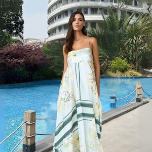 Bohemian Striped Maxi Dress: Sleeveless Flared Suspender Style