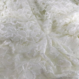 Stretch Ivory/Off White Lace Mesh with a Passion Flower and Leaves design by the Yard