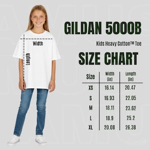 May include: A Gildan 5000B Kids Heavy Cotton Tee size chart displaying a white t-shirt with width and length measurement lines. The chart lists sizes XS through XL with corresponding width and length measurements in inches for each size.