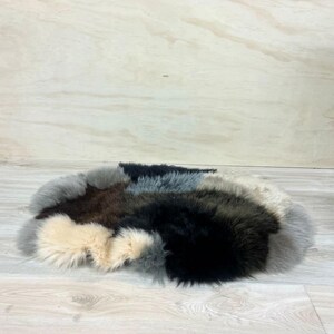 Oval Sheepskin Pet Bed – Multi-Colour Patched Design