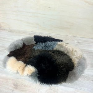 Oval Sheepskin Pet Bed – Multi-Colour Patched Design