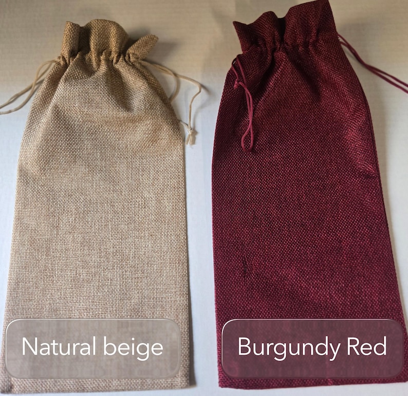 May include: Two tall, rectangular drawstring bags made of a textured woven fabric. One bag is natural beige with matching light-colored drawstrings, and the other is burgundy red with matching dark red drawstrings. Text labels read Natural beige and Burgundy Red.