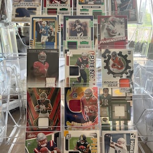 May include: A rustic wooden sign with the text "Welcome to our home" in a handwritten style. The sign features a distressed finish and a simple, inviting design, perfect for a front porch or entryway.