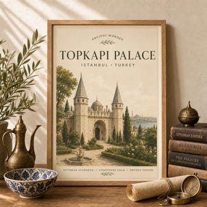 May include: A framed wall art print featuring an illustration of the Topkapi Palace in Istanbul, Turkey. The print includes the text "ANCIENT WONDER," "TOPKAPI PALACE," "ISTANBUL TURKEY," and "OTTOMAN SPLENDOR COURTYARD CALM EMPIRES ENDURE."
