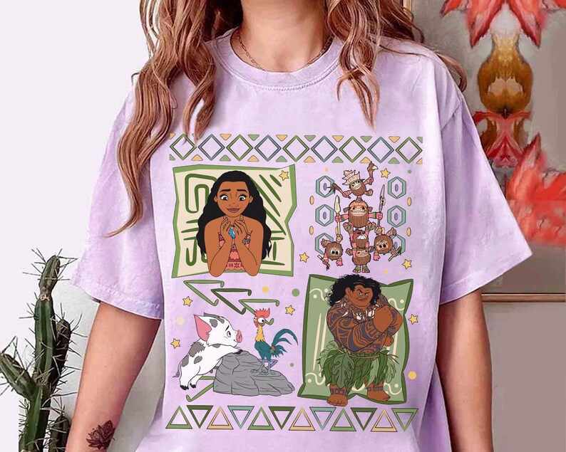 May include: A light purple t-shirt featuring four cartoon panels. The panels depict characters from a movie, including a woman, a group of monkeys, a pig, a rooster, and a man with tattoos. The shirt has a crew neck and short sleeves.