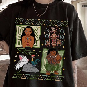 May include: Black t-shirt featuring colorful cartoon graphics of characters from a popular animated movie. The design includes images of a woman, a pig, a rooster, and a muscular man, all set against a geometric background.