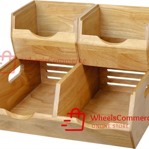 May include: A stackable wooden storage unit with four compartments. The unit is made of light-colored wood and features cut-out handles and slatted sides. The compartments are open-topped, providing easy access to stored items. The design is simple and functional.