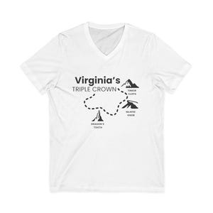 May include: White V-neck t-shirt featuring the text "Virginia's Triple Crown" with a map of the hiking trail. The map includes illustrations of Dragon's Tooth, Tinker Cliffs, and McAfee Knob. A great gift for hikers.