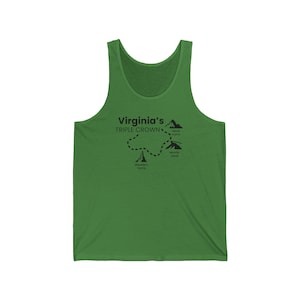 May include: Green tank top featuring the text "Virginia's Triple Crown" with a dotted line and illustrations of mountains. The design includes the names of the peaks: Dragon's Tooth, Tinker Cliffs, and McAfee Knob.