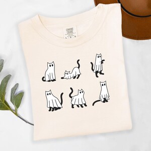 Comfort Colors Ghost Black Cat Shirt, Halloween Cat Shirt, Cat Mom Gift, Spooky Tee for Cat Lovers, Cute Halloween Graphic Tee (S–XXL)