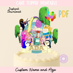 May include: A printable cake topper featuring cartoon characters, a rainbow, and balloons. The design includes the text "Cake Topper Printable," "Instant Download," and "PDF." The cake topper is personalized with the name "ADA."