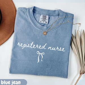Registered Nurse Shirt Comfort Colors® Coquette RN Tee Gift For Nurse Graduation Nursing Student Gift Minimal Script Bow Design Aesthetic