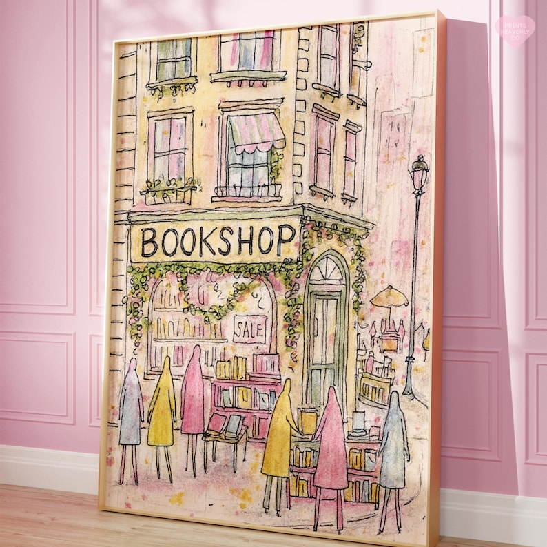 May include: Watercolor print of a quaint bookshop with the word "BOOKSHOP" above the entrance. The building is painted in soft yellows and pinks, with a "SALE" sign in the window. Figures in colorful coats stand in front of the shop.
