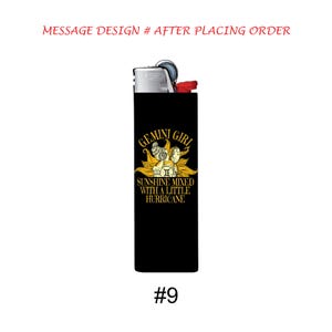 May include: Black lighter with a silver top and red accent. The lighter features the text "GEMINI GIRL SUNSHINE MIXED WITH A LITTLE HURRICANE" in gold lettering. The number "9" is at the bottom.