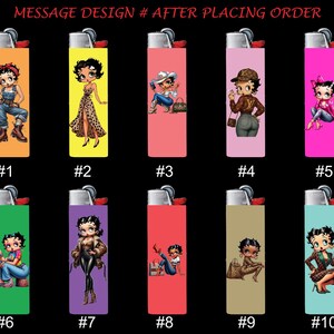 May include: A collection of ten lighters, each featuring a different Betty Boop design on a colored background. The lighters are numbered and include various outfits and poses of the cartoon character. The text "MESSAGE DESIGN # AFTER PLACING ORDER" is at the top.