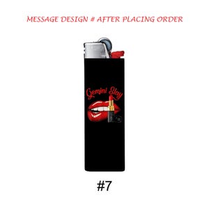 May include: Black lighter with a graphic of red lips, lipstick, and the words "Gemini Slay" in red script. The lighter has a silver top and the number "7" at the bottom.