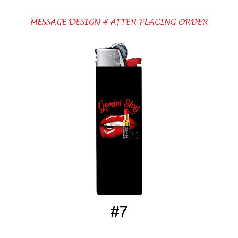 May include: Black lighter with a graphic of red lips, lipstick, and the words "Gemini Slay" in red script. The lighter has a silver top and the number "7" at the bottom.