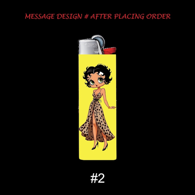 May include: A yellow lighter featuring a cartoon illustration of a woman in a polka dot dress. The lighter has the text "MESSAGE DESIGN # AFTER PLACING ORDER" and the number "#2" on it.