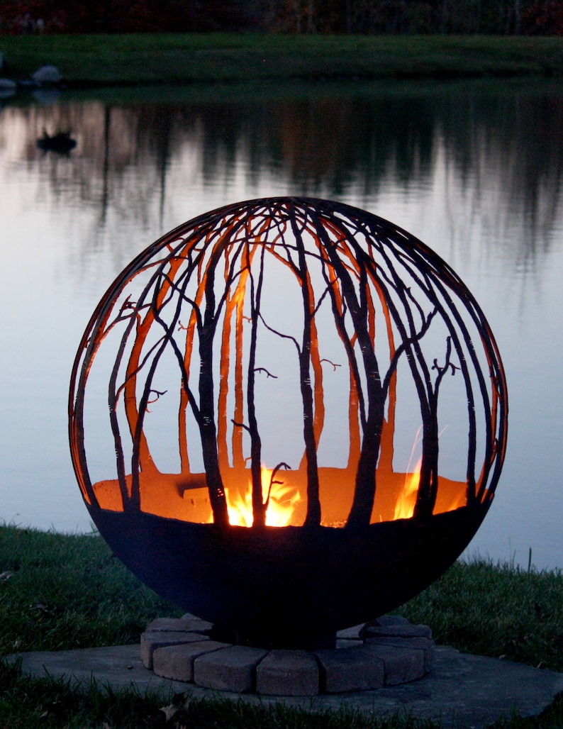 Winter Woods 37" CUSTOM Fire Pit Sphere. The peaceful birch trees seem to draw you in, as though standing in a quiet forest sanctuary.  Winter Woods is a gorgeous landscaping centerpiece to be sure!