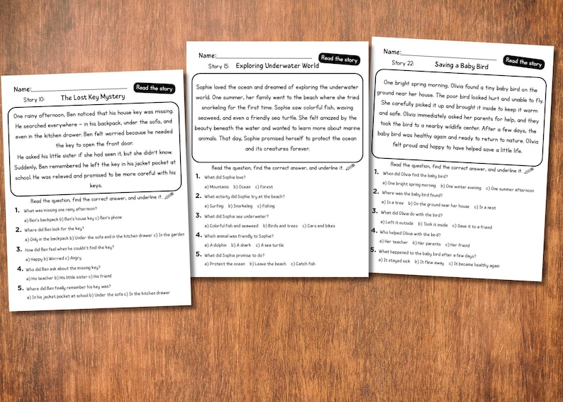 May include: Three worksheets with reading comprehension passages and questions are displayed on a wooden surface. The worksheets are titled "The Lost Key Mystery", "Exploring Underwater World", and "Saving a Baby Bird".