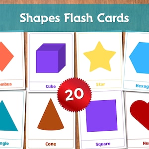May include: Shapes flash cards with colourful geometric shapes. Includes a rhombus, cube, star, hexagon, triangle, cone, square, and heart. The cards are displayed on a wooden surface.