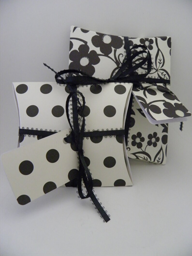 Black and off white two pack pillow box gift wrap set complete with coordinating ribbon.