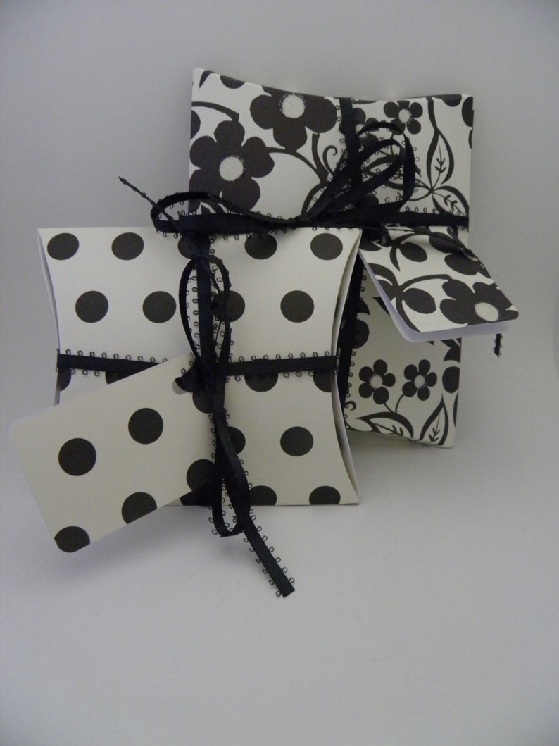 Black and off white two pack pillow box gift wrap set complete with coordinating ribbon.