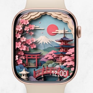 Può includere: Uno smartwatch con cassa beige chiaro e display digitale che mostra un'illustrazione in stile carta a strati di un paesaggio giapponese con una pagoda rossa, un ponte rosso, fiori di ciliegio, una montagna innevata e il testo Sun01 12:00.