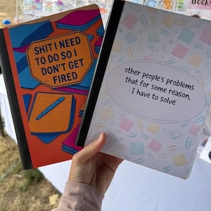 May include: Two notebooks with humorous text. One notebook has the text "SHIT I NEED TO DO SO I DON'T GET FIRED" on an orange cover. The other notebook has the text "other people's problems that for some reason, I have to solve" on a white cover.