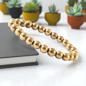 Gouden pyriet armband 6, 8, 10 mm | Topkwaliteit genezende kristalbeschermingsarmband voor mannen en vrouwen, uniseks handgemaakte armband pyrietedelsteen.