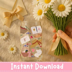 May include: A clear glass with illustrations of a picnic basket, strawberries, a book, a hat, and an envelope. A bouquet of daisies is held with a beige ribbon. The text "Instant Download" is at the bottom.