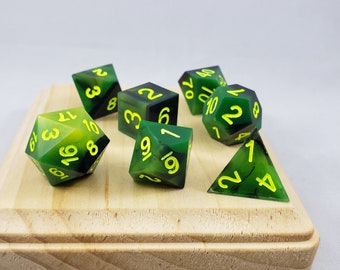 Jamaica Green, Yellow and Black Seven Resin Dice Sharp Edge DND Set