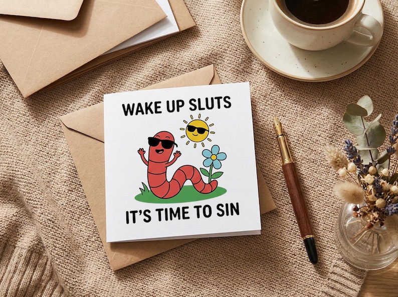 May include: A square greeting card with a white background featuring a cartoon red worm wearing black sunglasses, a yellow sun with sunglasses, and a blue flower. The text reads WAKE UP SLUTS IT'S TIME TO SIN in black capital letters.