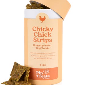 May include: A light orange cylindrical container of dog treats labelled "Chicky Chick Strips". The container has a white label and a chicken graphic. Several square dog treats are in front. The container holds 110g of treats.